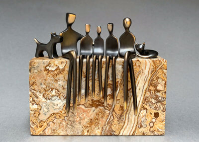 Family-with-3-boys-cat-and-dog-on-travertine