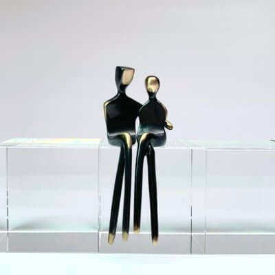 caress bronze couple