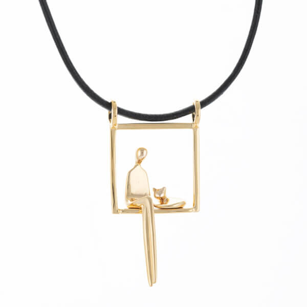 gold woman with cat pendant