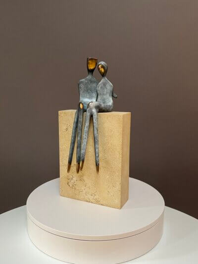 gray figurative sculpture, side view