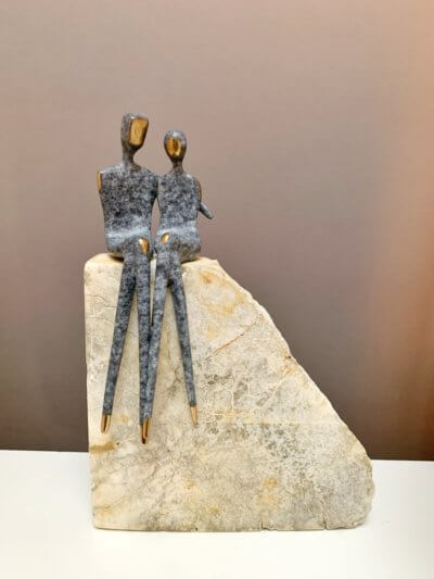 Gary patina bronze on weathered marble plinth