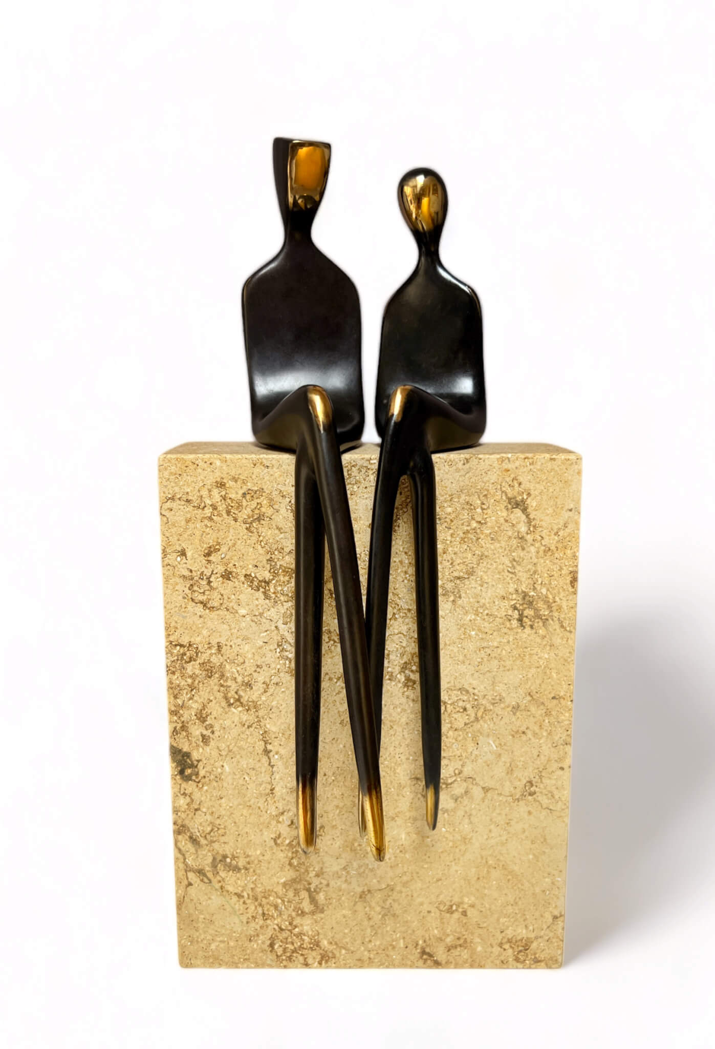 The two of us - bronze anniversary solid bronze sculpture of a seated couple by Yenny Cocq