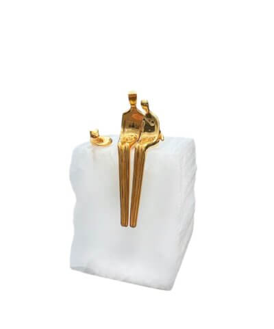 Gold sculpture with cat