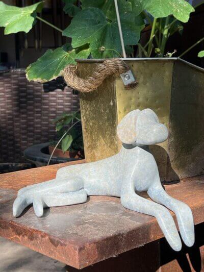 Lying down bronze dog in 10"
