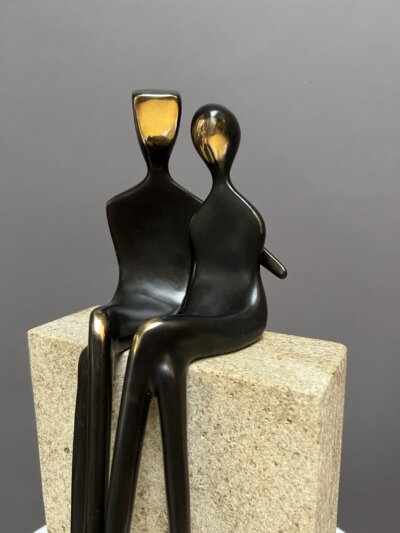 Caress 10" bronze sculpture with golden highlights