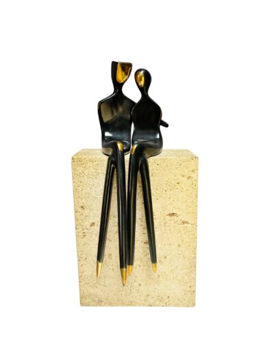 Caress mounted on tan limestone