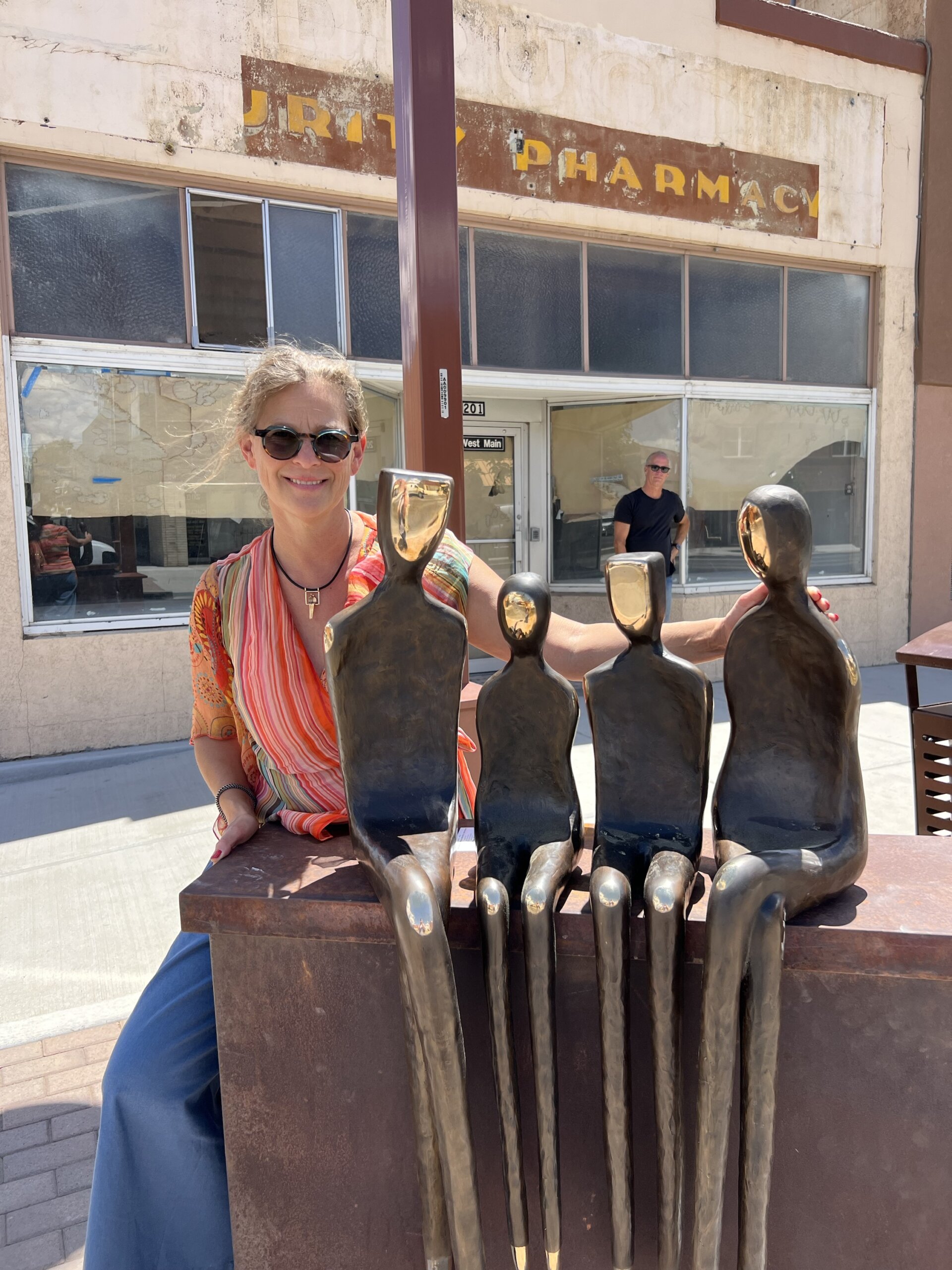 Family of four bronze sculpture installed on Main Street, Farmington NM
