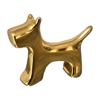 miniature sculpture of Terrier dog in gold