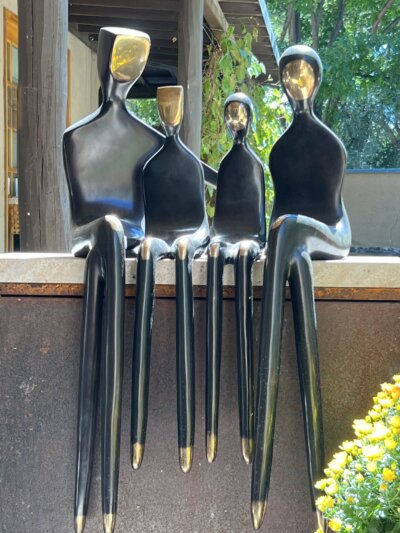 outdoor sculpture family in bronze