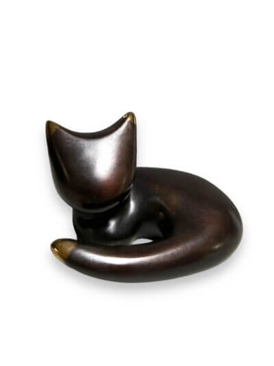 lying down cat bronze sculpture